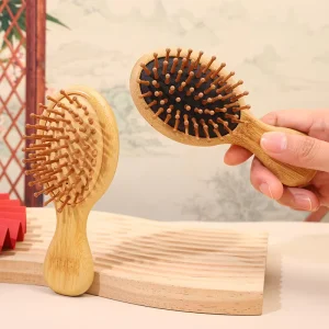 Portable Mini Bamboo Handle Carbonized Pin Bristle Massage Hairbrush for Children with Cushion Paddle Vent Feature Travel